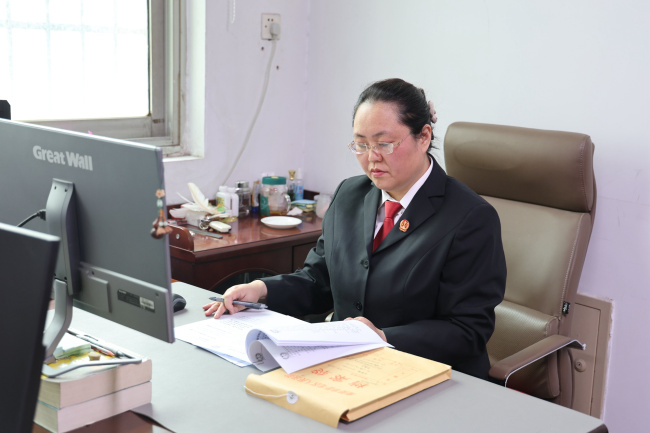 王丽飞：深耕道交审判 践行为民初心